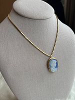 Necklace displayed on bust showing pendant front view