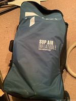 Front of blue Tahe SUP Air Inflatable carry bag