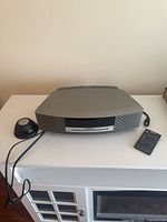 Angled view showing top cover and grille pattern