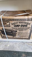 Box of Mil-Spec Great Northern Camp Stove. Shows product details, features, and packaging condition.