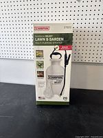 Front side of box showing Chapin SureSpray Select Lawn & Garden Multi-Purpose Sprayer with brand and product details.