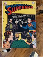 Front cover showing Superman in costume and Lois Lane as a professor in front of students