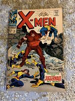 Front cover showing X-Men logo, Juggernaut and team under attack
