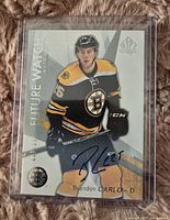 Front side of 2016-17 SP Authentic Future Watch Brandon Carlo autograph trading card, showing player image, autograph, and serial number 070/999.