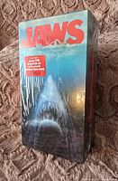Front view of sealed JAWS VHS tape set showing iconic shark artwork and Special Collector's Edition label.