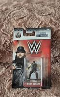 Front view of the sealed WWE Nano Metalfigs mini figure packaging showing Bray Wyatt figure and branding.