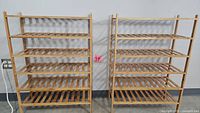 Pair of 5-tier bamboo shoe shelving units shown side by side for scale and design confirmation