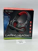 Original packaging box of BYTECH Gaming Headset with visible damage, front view showing brand and headset image