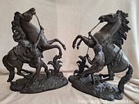 Both sculptures side by side, front view