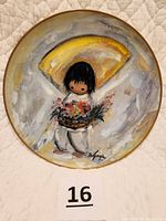 Front view of the collectible plate showing the painting of The Flower Boy in soft impressionist colors with signature and gold rim.