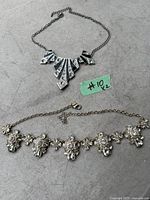 Both necklaces side by side showing their overall shape and design.