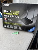 Photo of ASUS RT-N12 Wireless-N300 3-in-1 Router product box