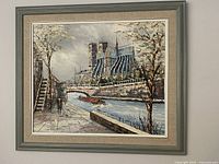 Full front view of vintage oil painting featuring Notre Dame Cathedral and river Seine scene with framed presentation