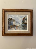 Framed vintage oil painting on canvas showing full frame and painting context on wall