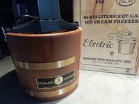 Wooden outer bucket labeled Sterling 5 Quart Freezer with box shown behind