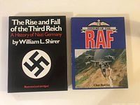 Front covers of two hardcover books: 'The Rise and Fall of the Third Reich' with black cover and swastika, and 'History of the RAF' with blue cover and RAF jet aircraft.