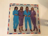Front cover of the ABBA vinyl album showing the four band members and the album title.
