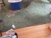 Partial view showing solid green field, scattered debris