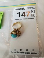 Ring on MaxSold identification card