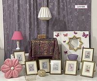 View of entire lot showing curtains, lamps, framed Flower Fairies artworks, metal magnet boards with butterfly magnets, planter, tray table, mirror, box, pillow, and decorative objects.