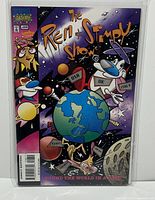 Front cover of The Ren & Stimpy Show issue #1 comic book with colorful space-themed artwork featuring Ren and Stimpy around a globe.