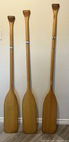 Three paddles side by side showing full length