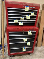 Front view of stacked top chest and bottom rolling cabinet showing drawer configuration and keys