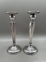 Front view of both candlesticks side by side