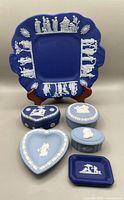 Full view of all 6 Wedgwood Jasperware items including the cobalt blue platter, trinket boxes, ashtray and heart-shaped dishes