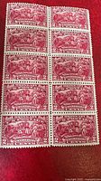 Block of 10 US 2 cent stamps showing the Surrender of Burgoyne scene in deep red. The stamps are in excellent condition with full original gum and no tears.