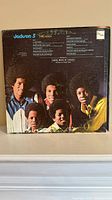 Back cover of Jackson 5 Third Album showing tracklist and photo of band members.