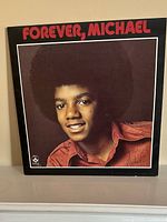 Front cover showing Michael Jackson portrait on Forever album sleeve
