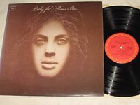 Front cover and vinyl record showing red Columbia label