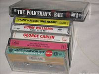 Spine view of six cassette albums plus double set for titles and condition