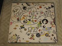 Front cover with Led Zeppelin III artwork and rotating wheel