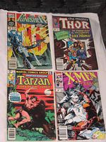 Front covers of all four comics arranged together