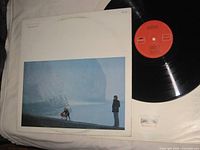 Front jacket and vinyl record visible