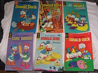 All six Walt Disney comic books laid out
