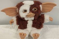 Gizmo plush doll brown and white with large ears and sculpted face