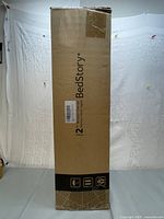 Packaged mattress topper in BedStory box, labeled as Bamboo Charcoal Memory Foam Topper, 2 inch thickness, full size.