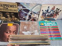 Photo of vinyl record covers including The Supremes, 2001 Space Odyssey, and compilation album