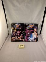 Front view of Tripping the Rift Season 1 and 2 DVD box sets with colorful animated character artwork from the series.