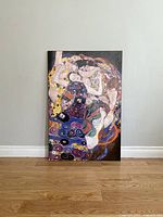 Full view of the Klimt art plaque leaning against a wall showing vibrant colors and artwork.