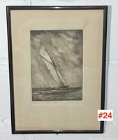 Framed signed print of yacht "Britannia" front view