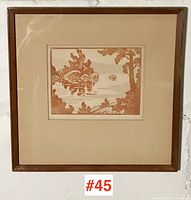 Framed print on wall showing full frame and mat