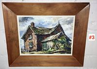 Full view of framed painting showing artwork and wood frame