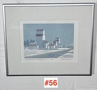Full framed serigraph in silver frame with lot number 56 visible