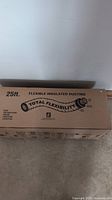 Cardboard box for 25 ft flexible insulated ducting labeled 'TOTAL FLEXIBILITY' with product info.