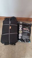 Ten black fabric Root Pouch pots bundled with a black Pro Mix Vermiculite bag.