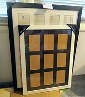 Two collage photo frames stacked, black frame behind white frame. White frame holds 9 photos; 3 horizontal on top and 6 below in 2x3 grid. Black frame holds 9 photos in a 3x3 grid.